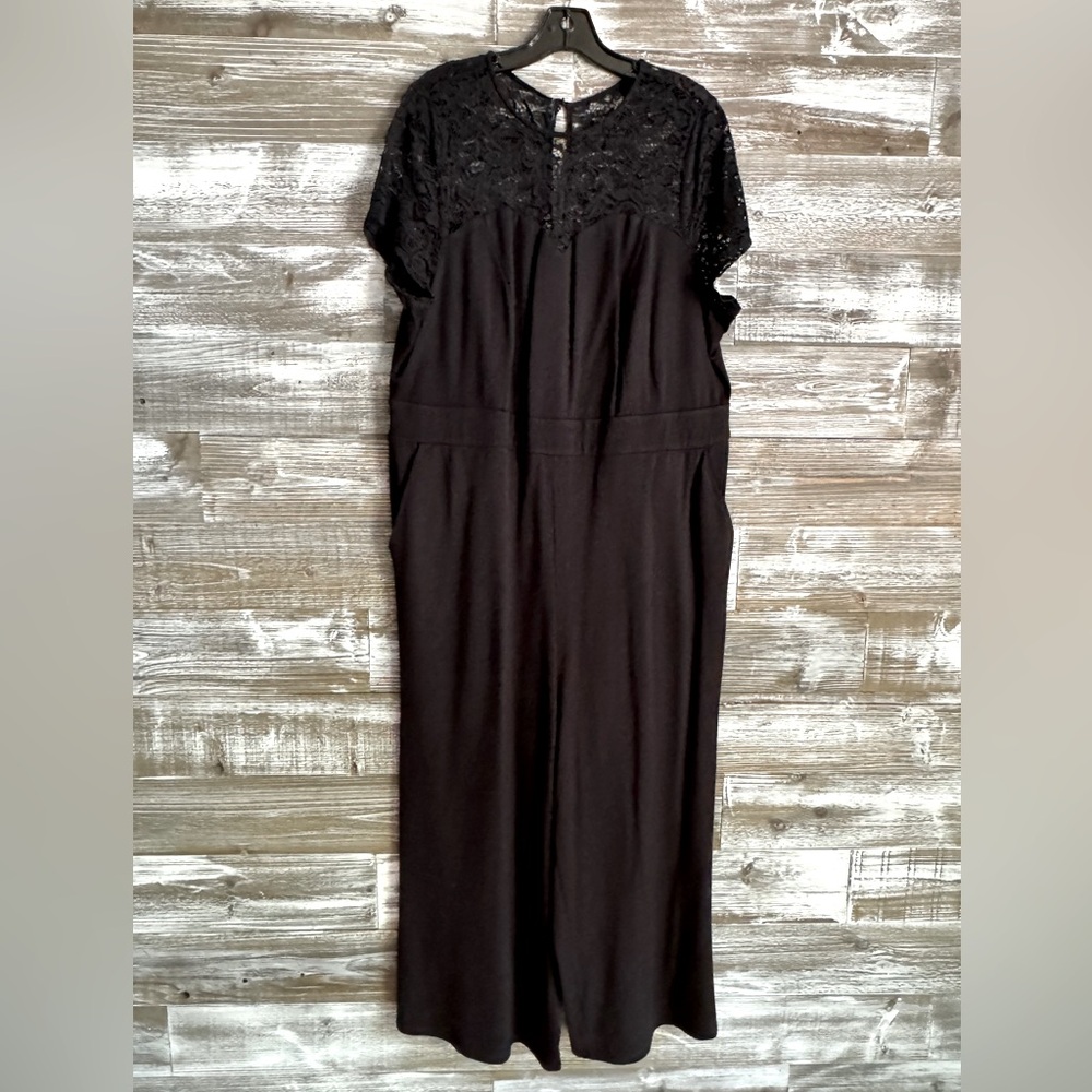 Torrid black jumpsuit with lace and pockets